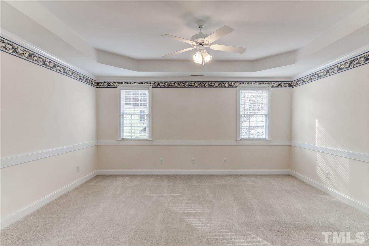 2401 Carruthers Court Raleigh, NC 27615 - Photo 15 of 25 a view of an empty room with a window