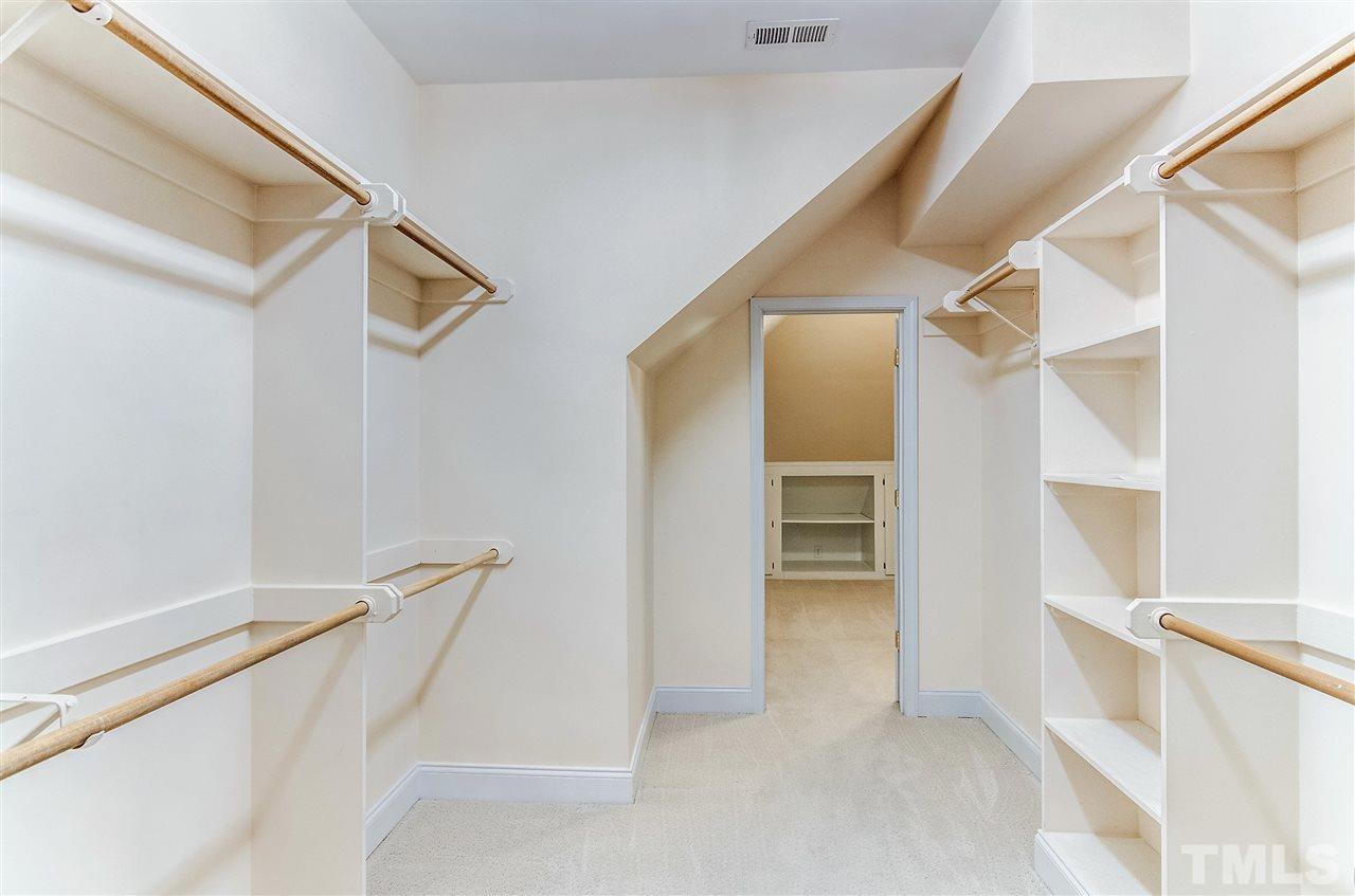 2401 Carruthers Court Raleigh, NC 27615 - Photo 18 of 25 a view of walk in closet