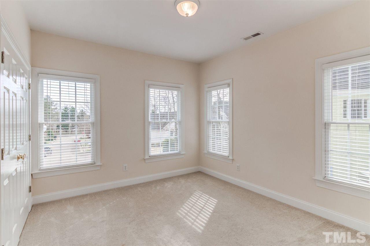 2401 Carruthers Court Raleigh, NC 27615 - Photo 21 of 25 a view of an empty room with a window