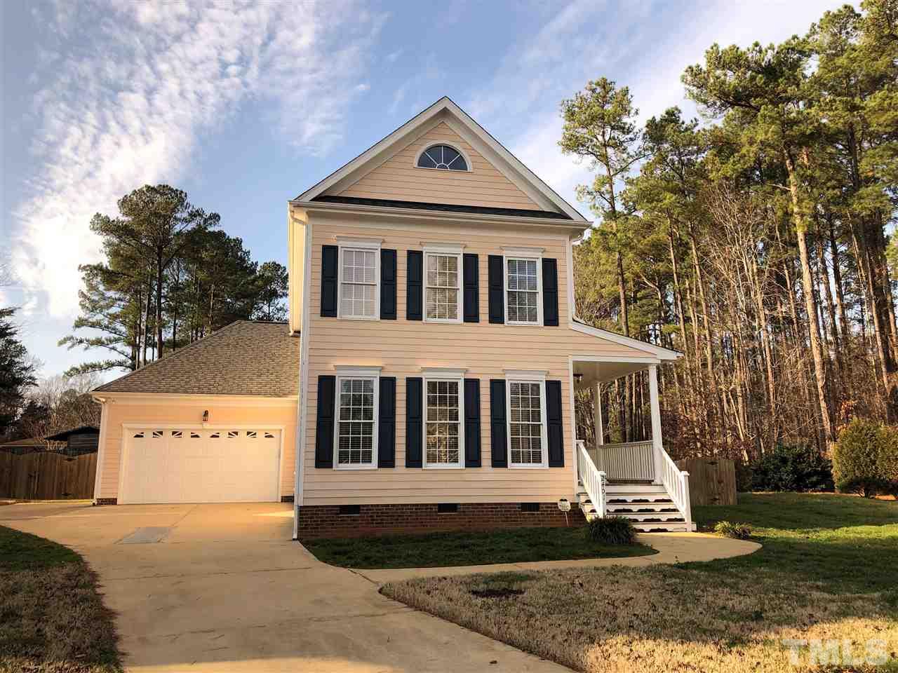 2401 Carruthers Court Raleigh, NC 27615 - Photo 25 of 25 a front view of a house with a yard