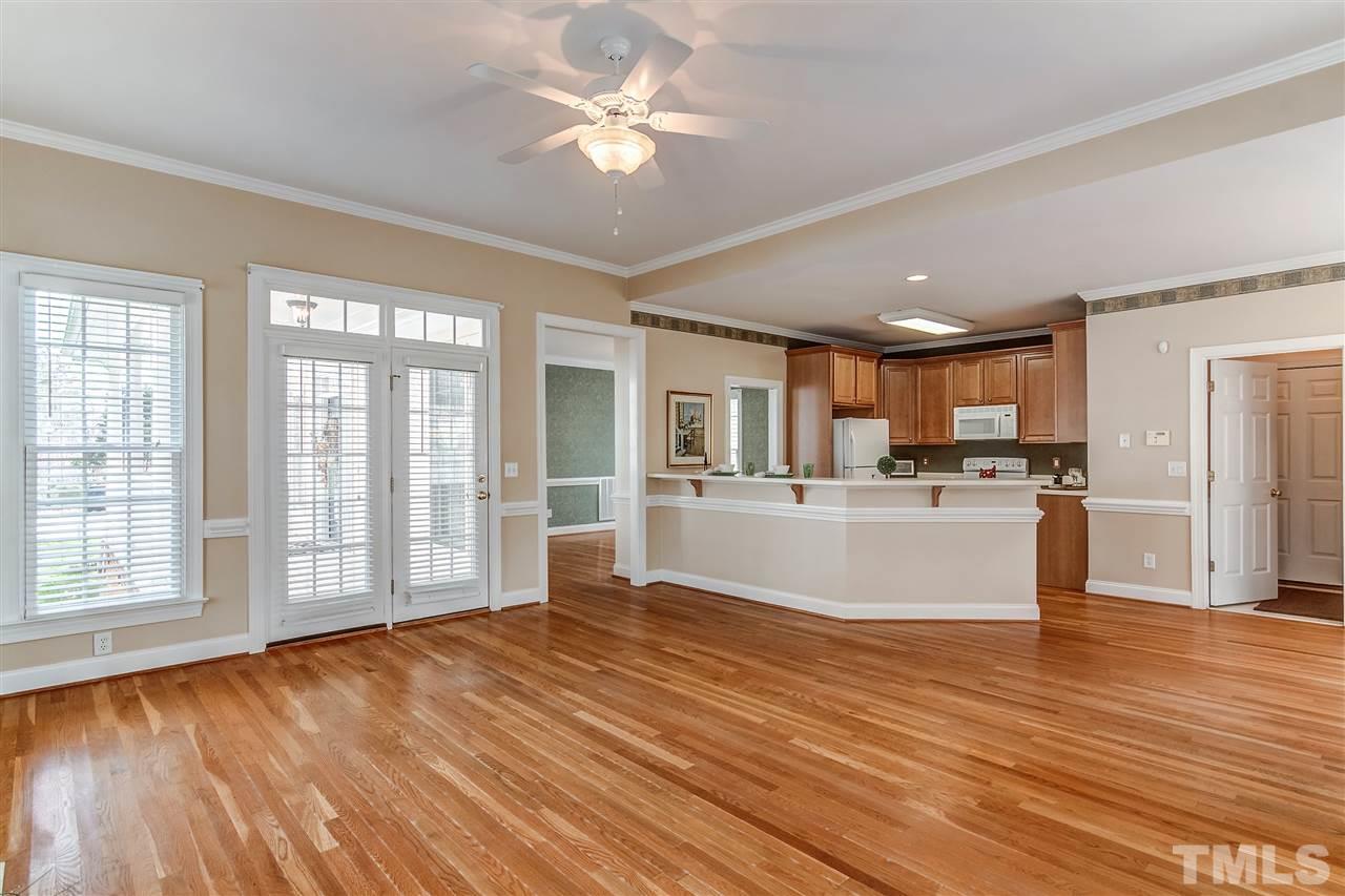 2401 Carruthers Court Raleigh, NC 27615 - Photo 7 of 25 a view of kitchen with stove and cabinets