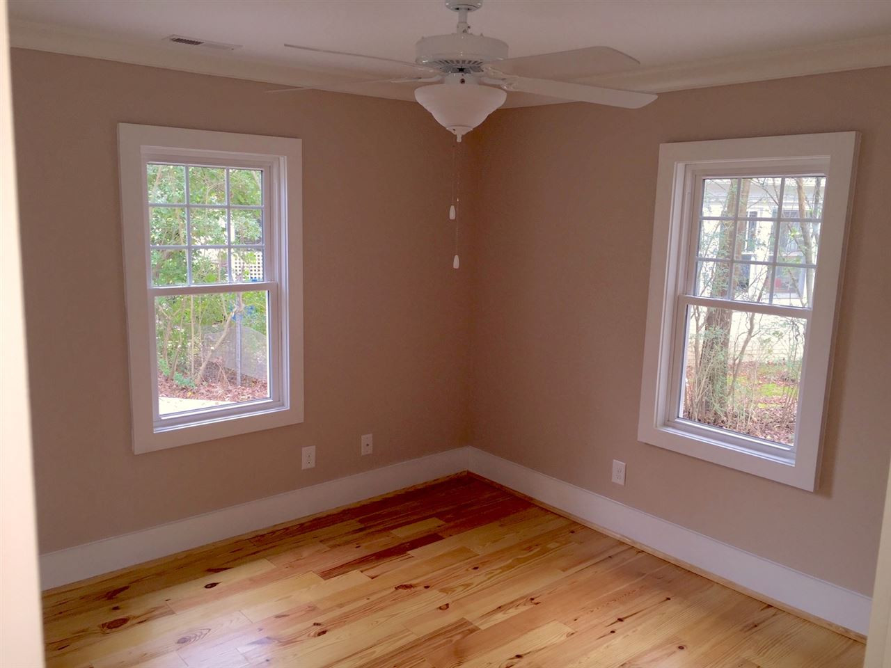 3132 Stanhope Avenue Raleigh, NC 27607 - Photo 6 of 11 Large Master Bedroom with Tons of Natural Light with windows on 2 sides, Hardwood Floors, and a HUGE Closet! Master Bedroom
