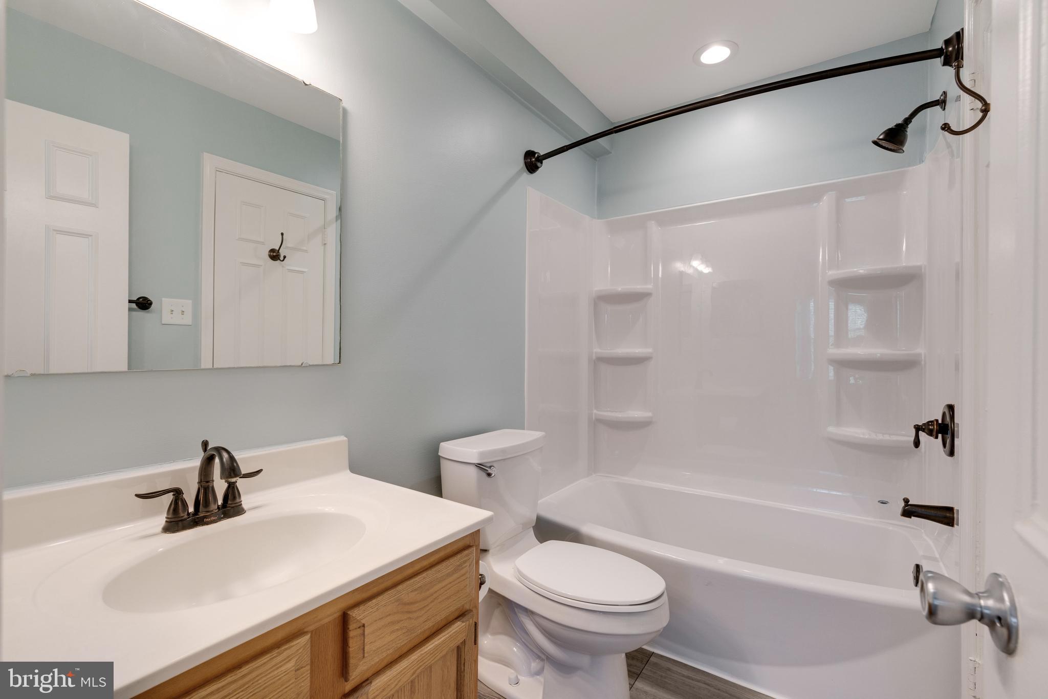 8021 Edinburgh Drive Springfield, VA 22153 - Photo 13 of 17 New tub, flooring & freshly painted!