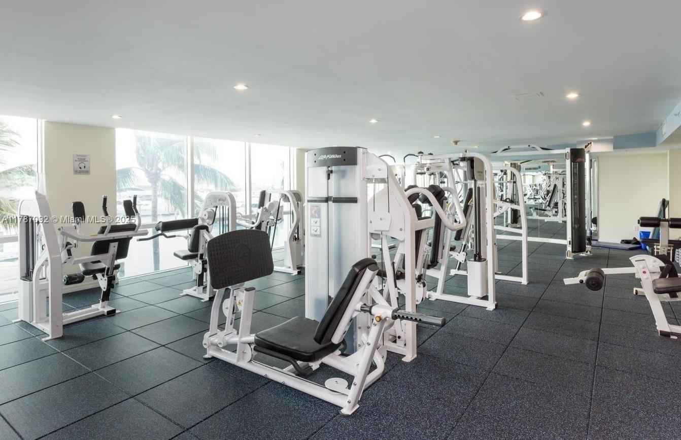 90 Alton Road, Unit 1 Miami Beach, FL 33139 - Photo 32 of 36 a view of a room with gym equipment