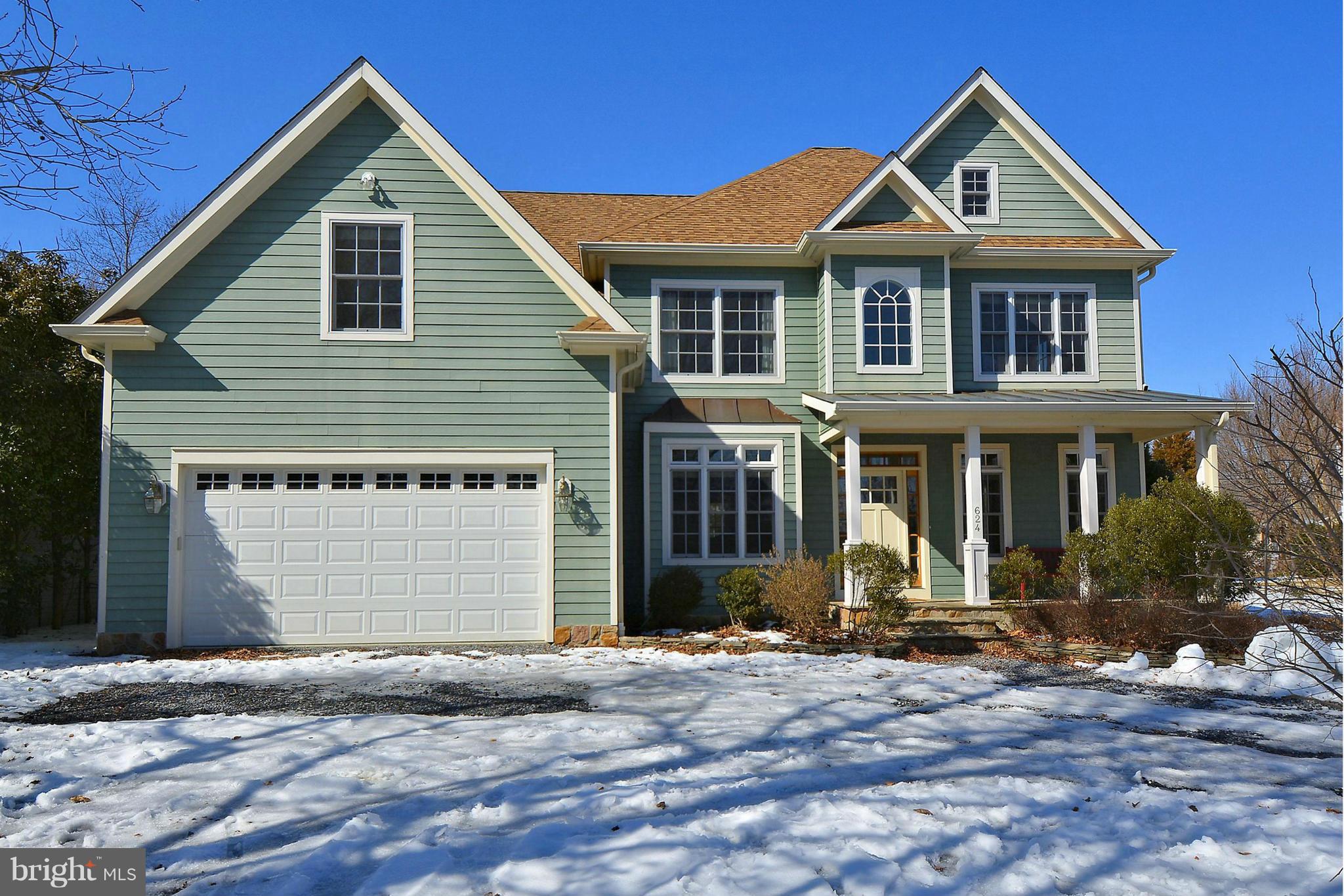 624 Truxton Road Annapolis, MD 21409 - Photo 1 of 30 a front view of a house with a yard