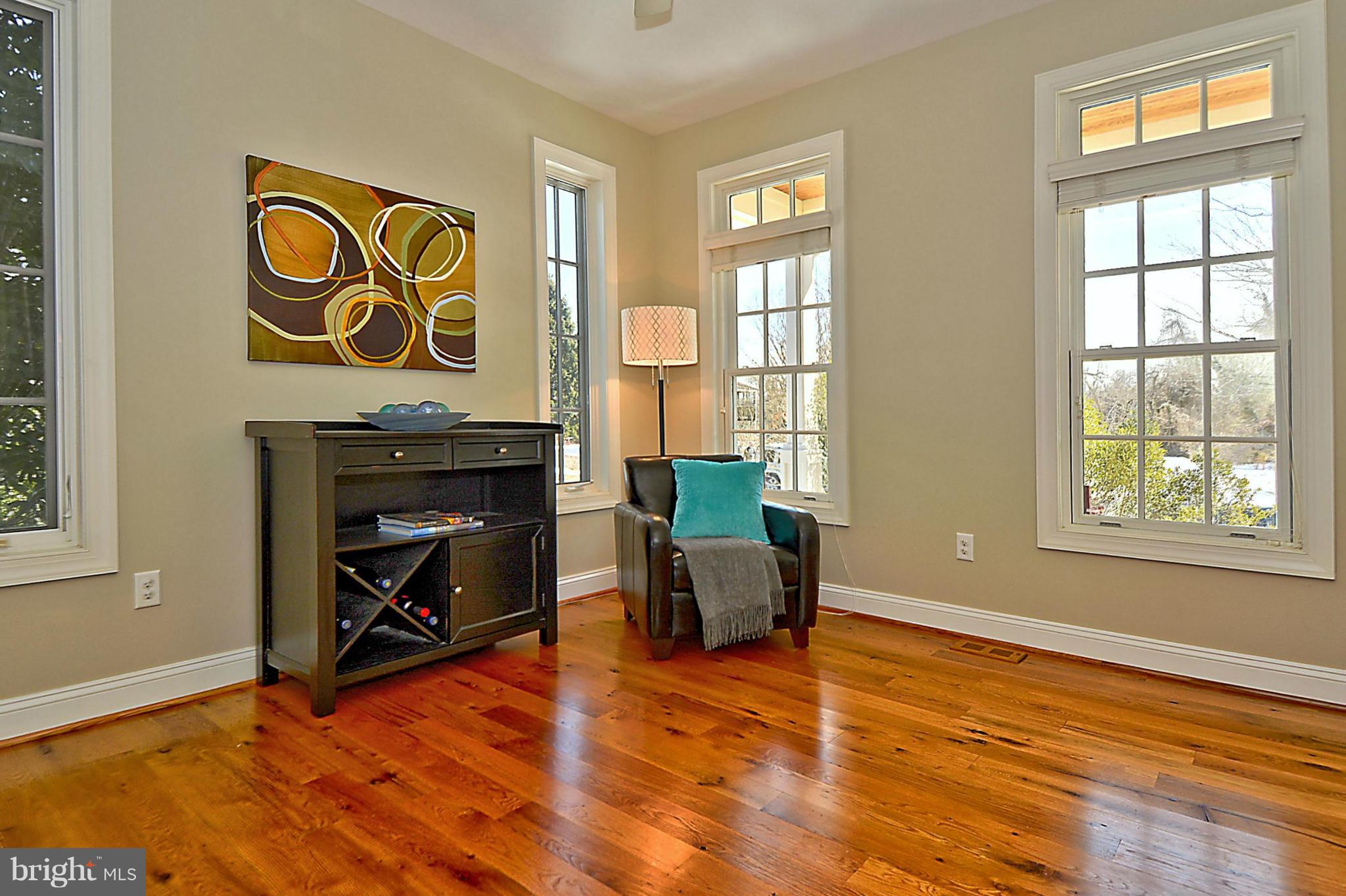 624 Truxton Road Annapolis, MD 21409 - Photo 11 of 30 a view of an empty room with wooden floor and a window