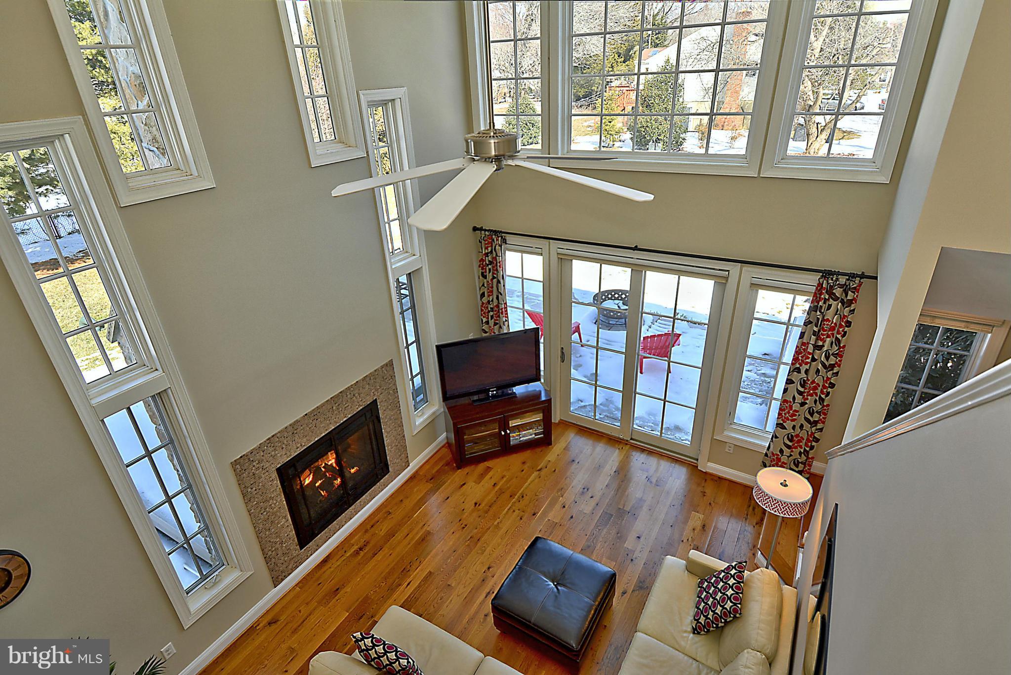 624 Truxton Road Annapolis, MD 21409 - Photo 12 of 30 a living room with furniture and a fireplace
