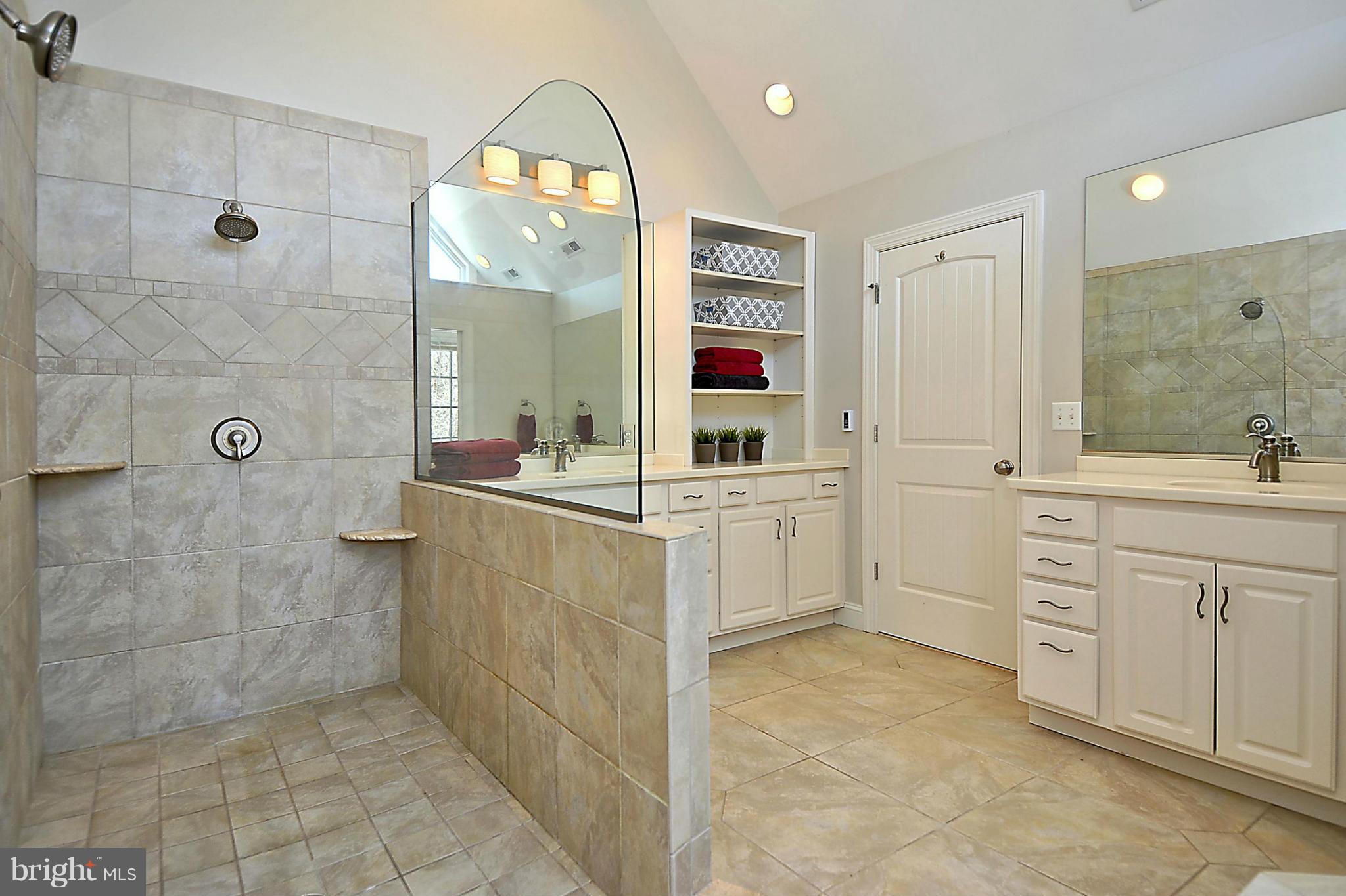 624 Truxton Road Annapolis, MD 21409 - Photo 19 of 30 a bathroom with a double vanity sink mirror and shower