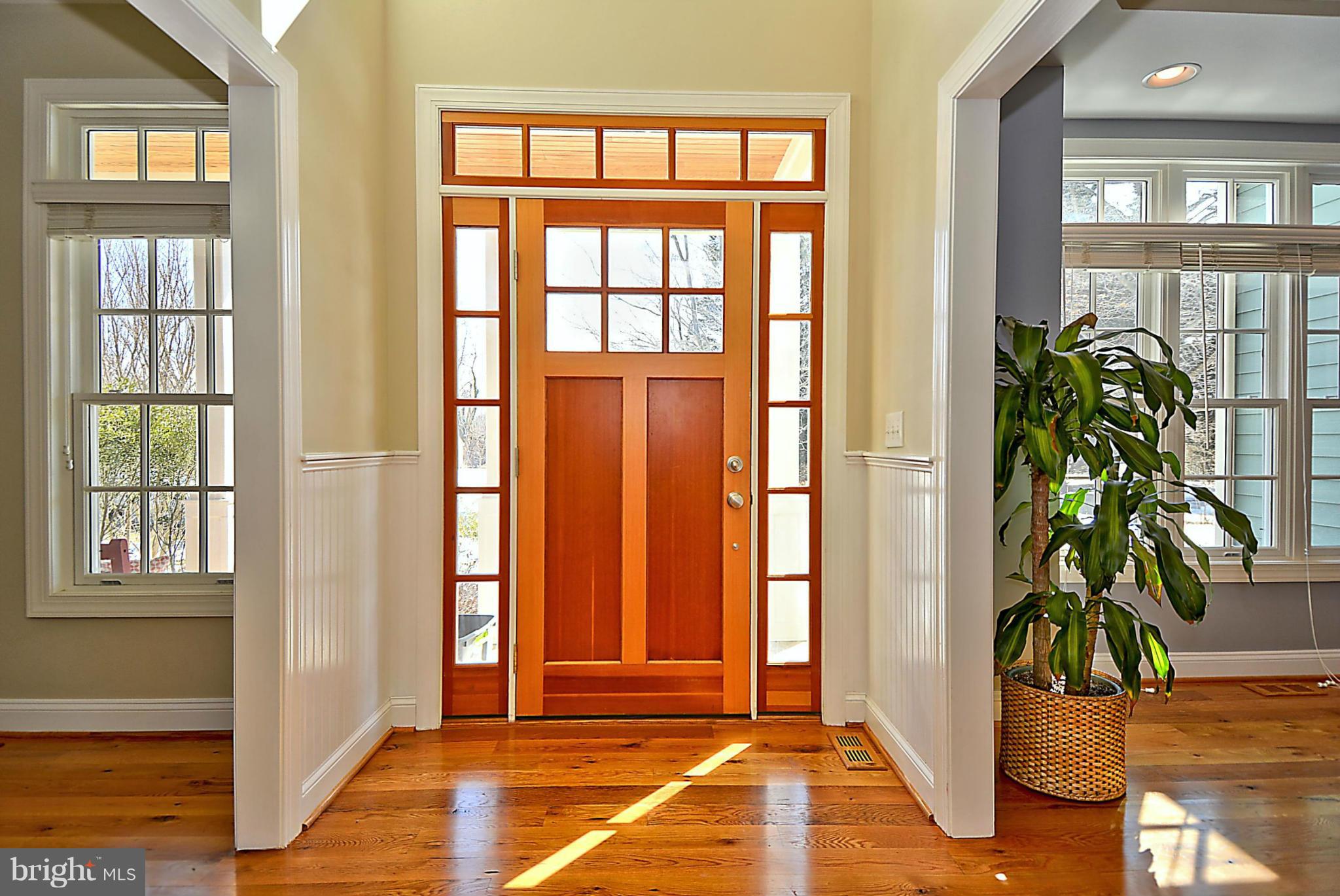 624 Truxton Road Annapolis, MD 21409 - Photo 4 of 30 a view of entryway with wooden floor and a potted plant
