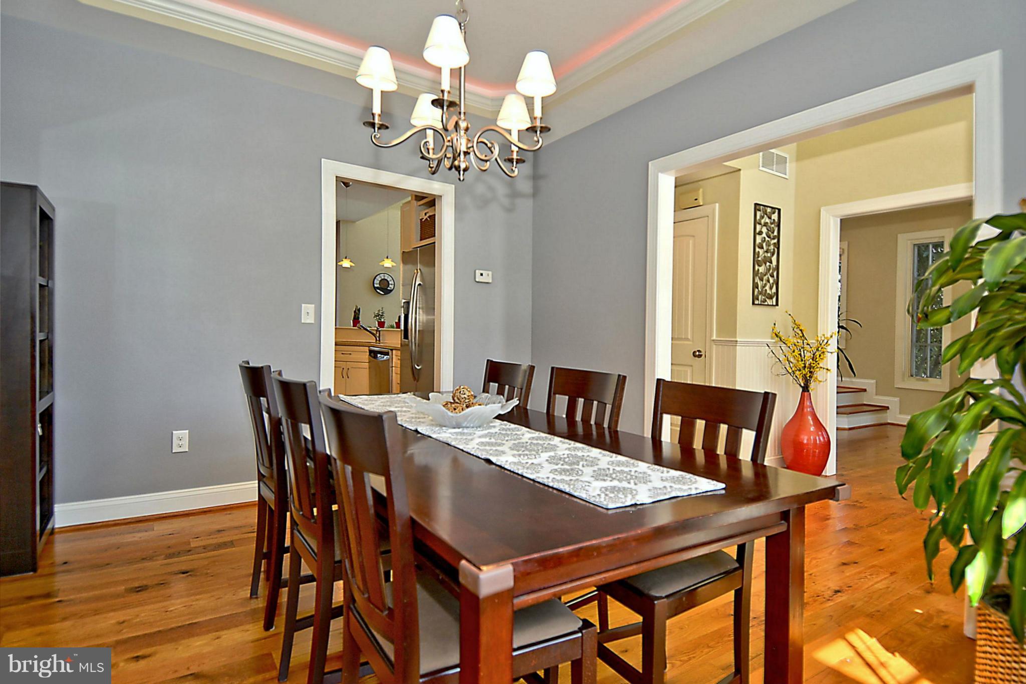 624 Truxton Road Annapolis, MD 21409 - Photo 5 of 30 a view of a dining room with furniture and wooden floor