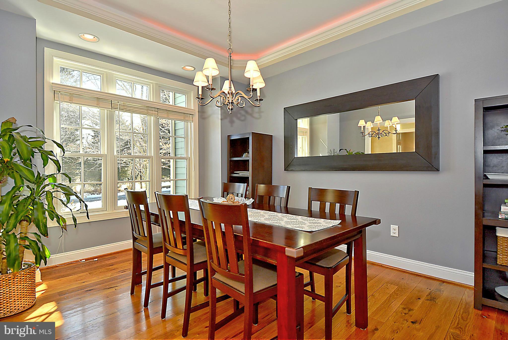 624 Truxton Road Annapolis, MD 21409 - Photo 6 of 30 a view of a dining room with furniture window and wooden floor