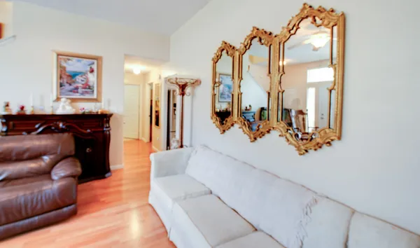 a view of a living room and bathroom