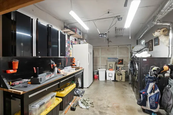a room with storage and utility room