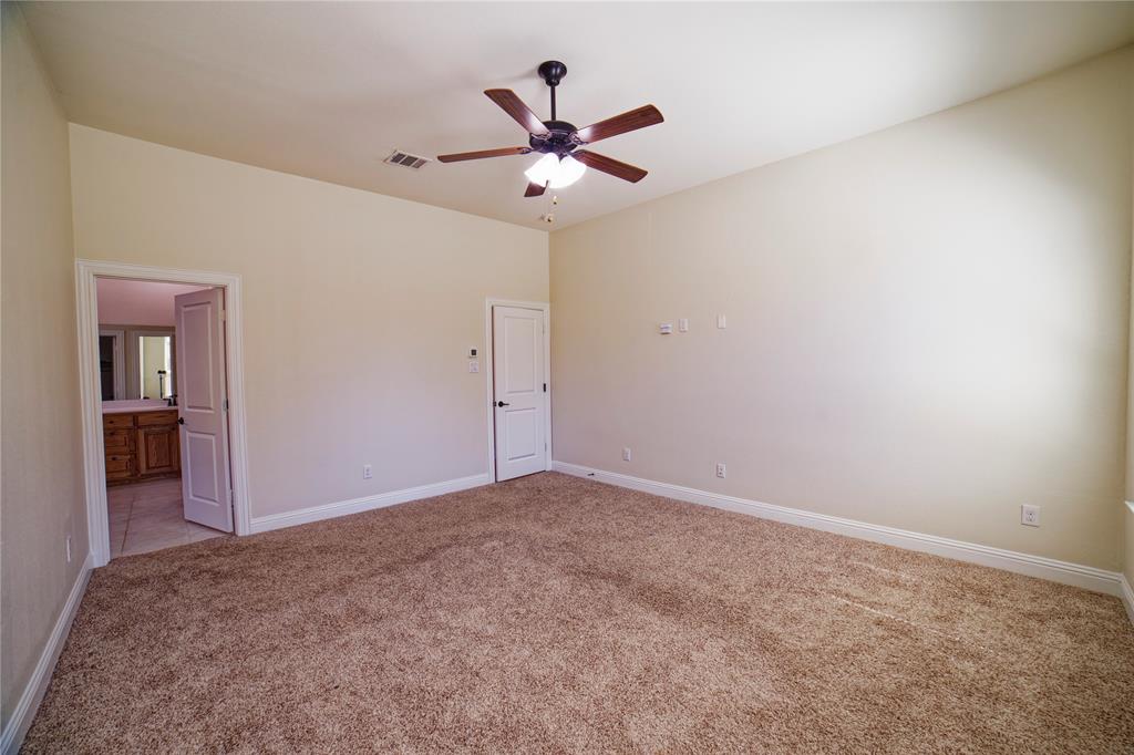 10929 Calvert Place McKinney, TX 75071 - Photo 22 of 39 a view of a livingroom with a ceiling fan and window