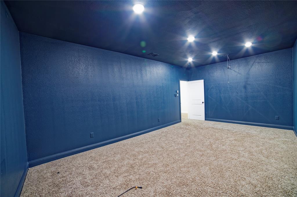 10929 Calvert Place McKinney, TX 75071 - Photo 27 of 39 a view of an empty room