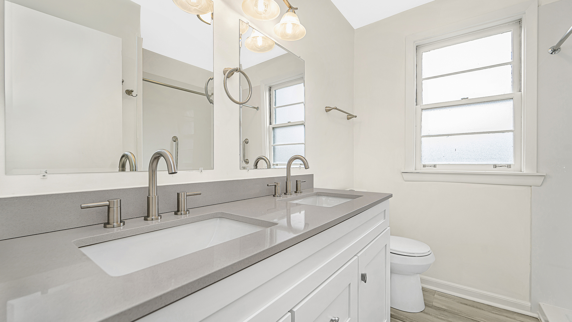 1314 Pitner Avenue Evanston, IL 60201 - Photo 13 of 19 a bathroom with a sink and a toilet