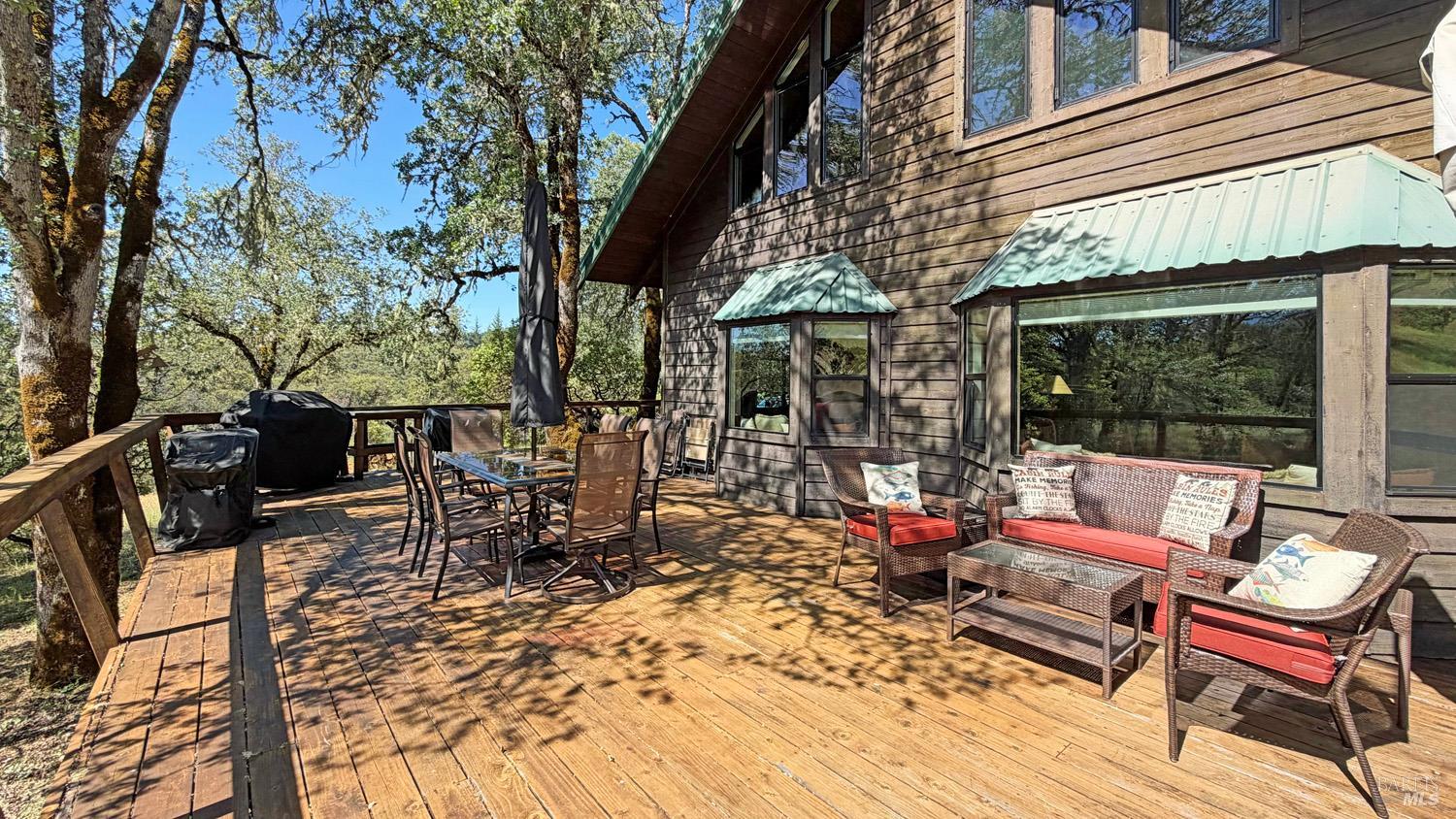 31312 High Point Road Potter Valley, CA 95469 - Photo 38 of 58 a backyard of a house with outdoor seating