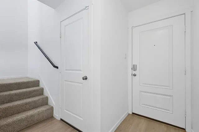 a view of entryway with stairs