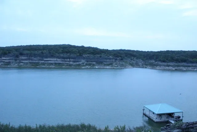 a view of a lake with mountains in the background