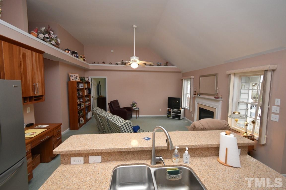 9904 Wyngate Ridge Drive Raleigh, NC 27617 - Photo 21 of 39 a view of a dining room with furniture