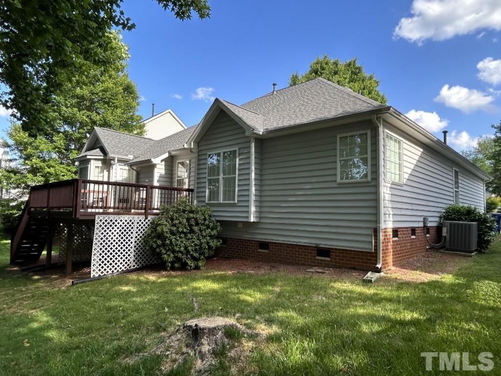 9904 Wyngate Ridge Drive Raleigh, NC 27617 - Photo 37 of 39 a front view of a house with garden