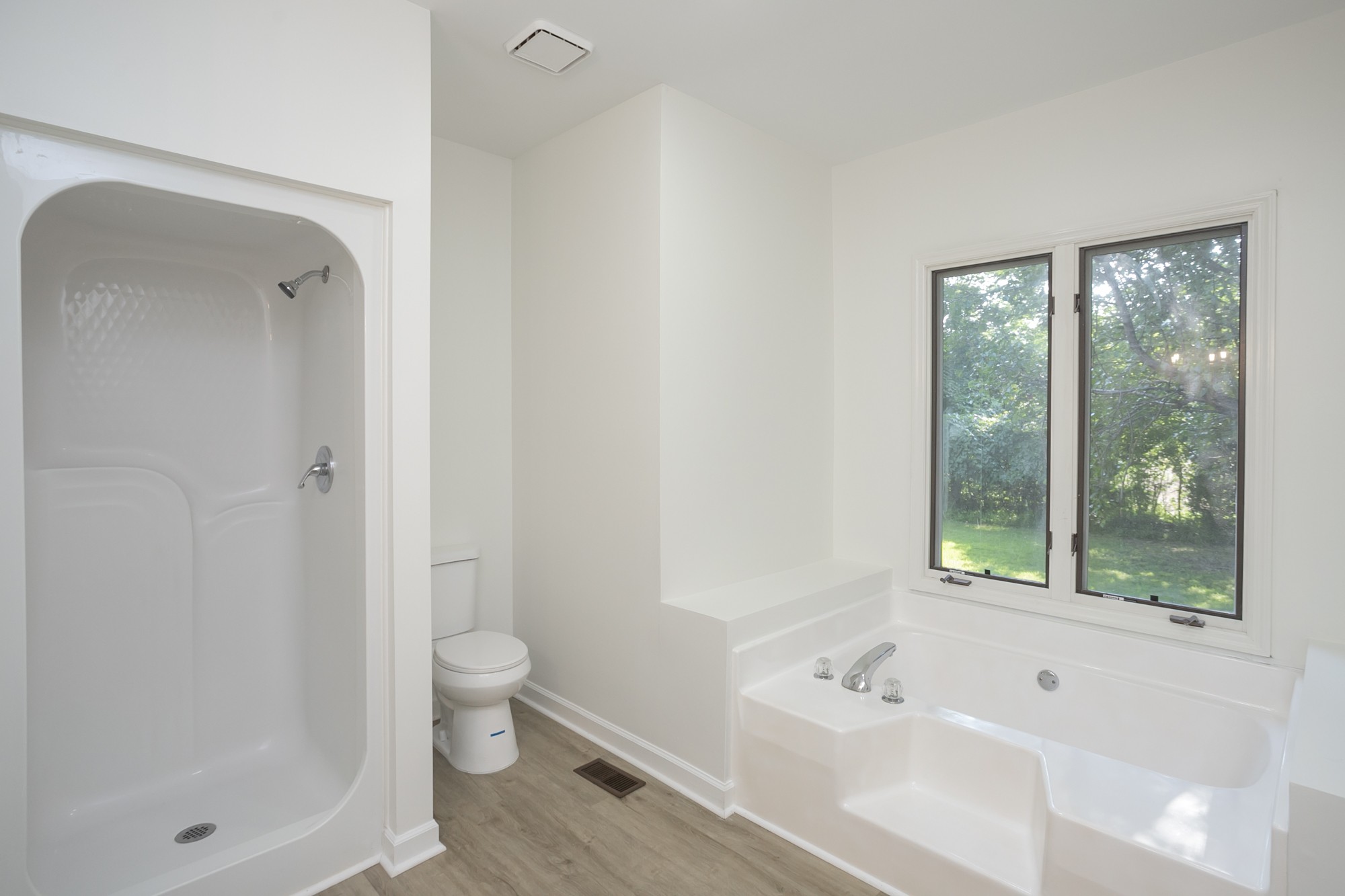 103 MacIntosh Drive Springfield, TN 37172 - Photo 13 of 20 a bathroom with a bathtub shower and toilet