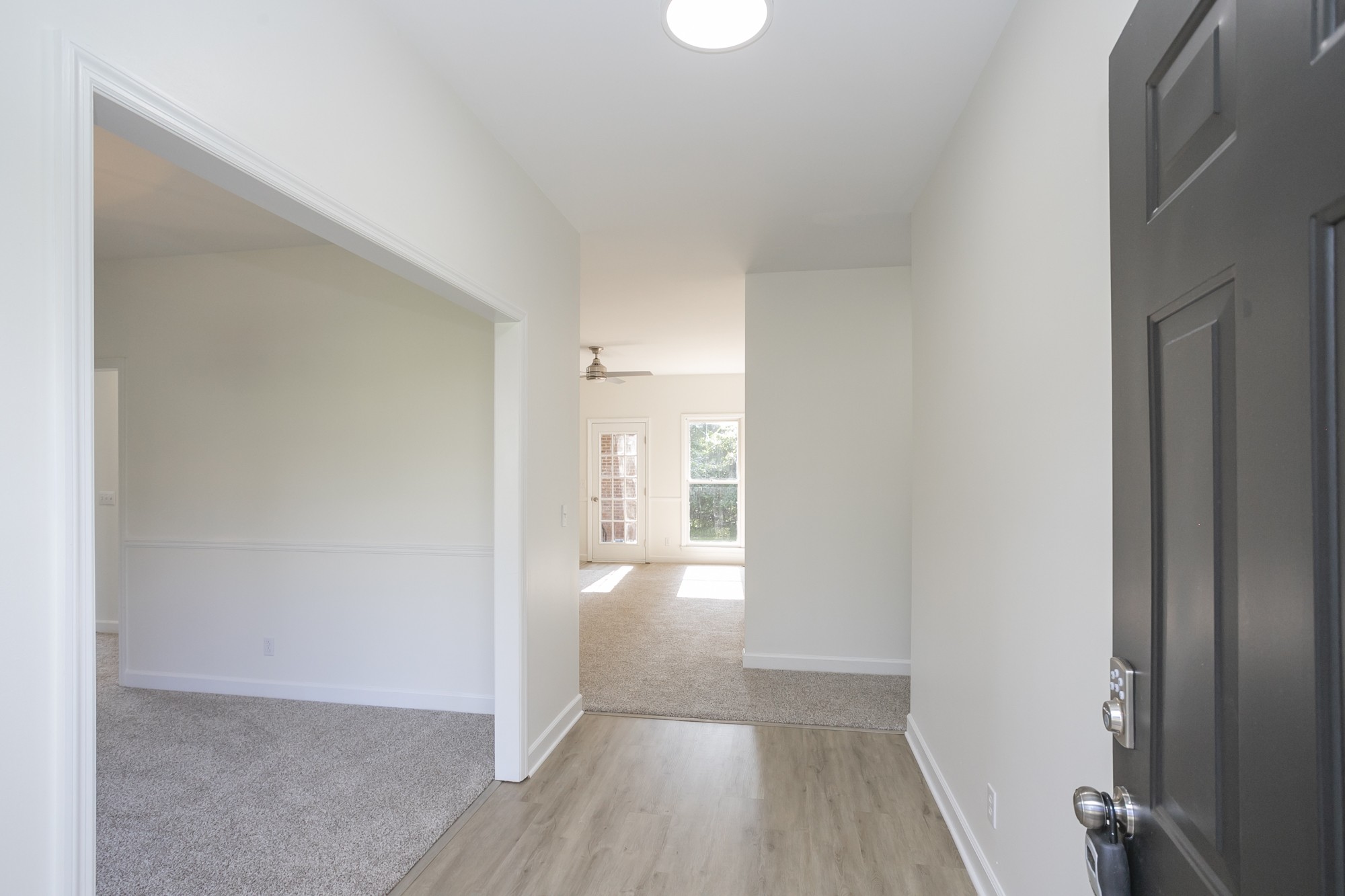 103 MacIntosh Drive Springfield, TN 37172 - Photo 3 of 20 a view of a hallway with wooden floor