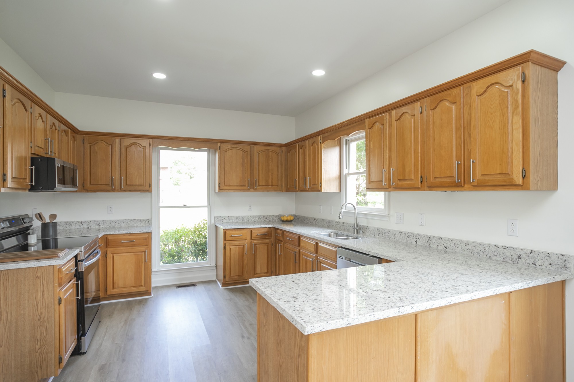 103 MacIntosh Drive Springfield, TN 37172 - Photo 8 of 20 a kitchen with a sink a stove and cabinets