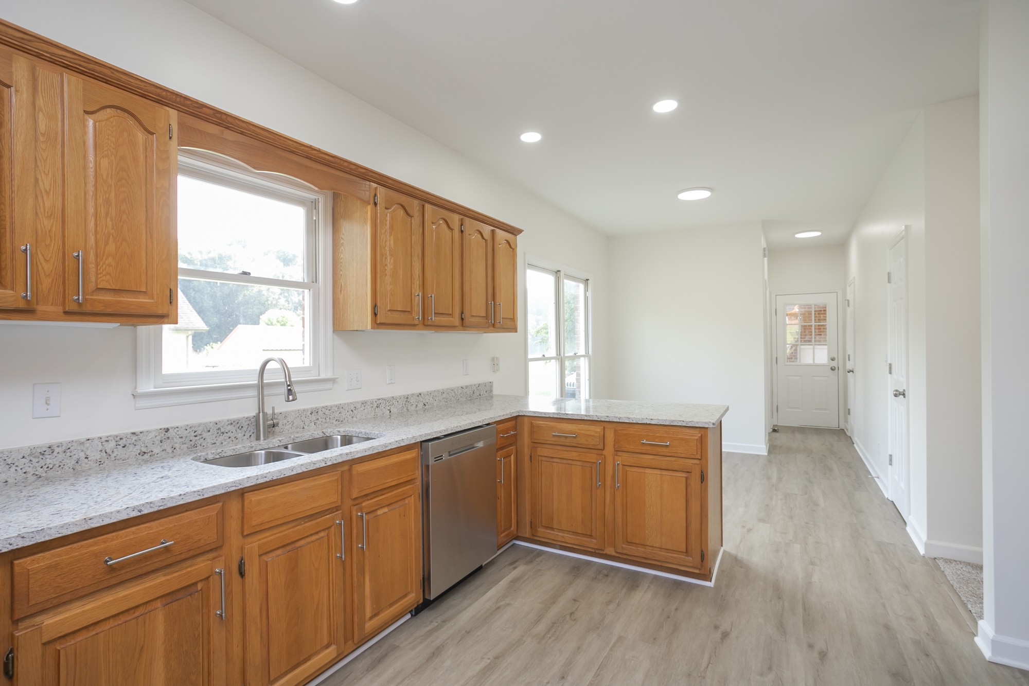 103 MacIntosh Drive Springfield, TN 37172 - Photo 10 of 20 a kitchen with a sink wooden floor and window