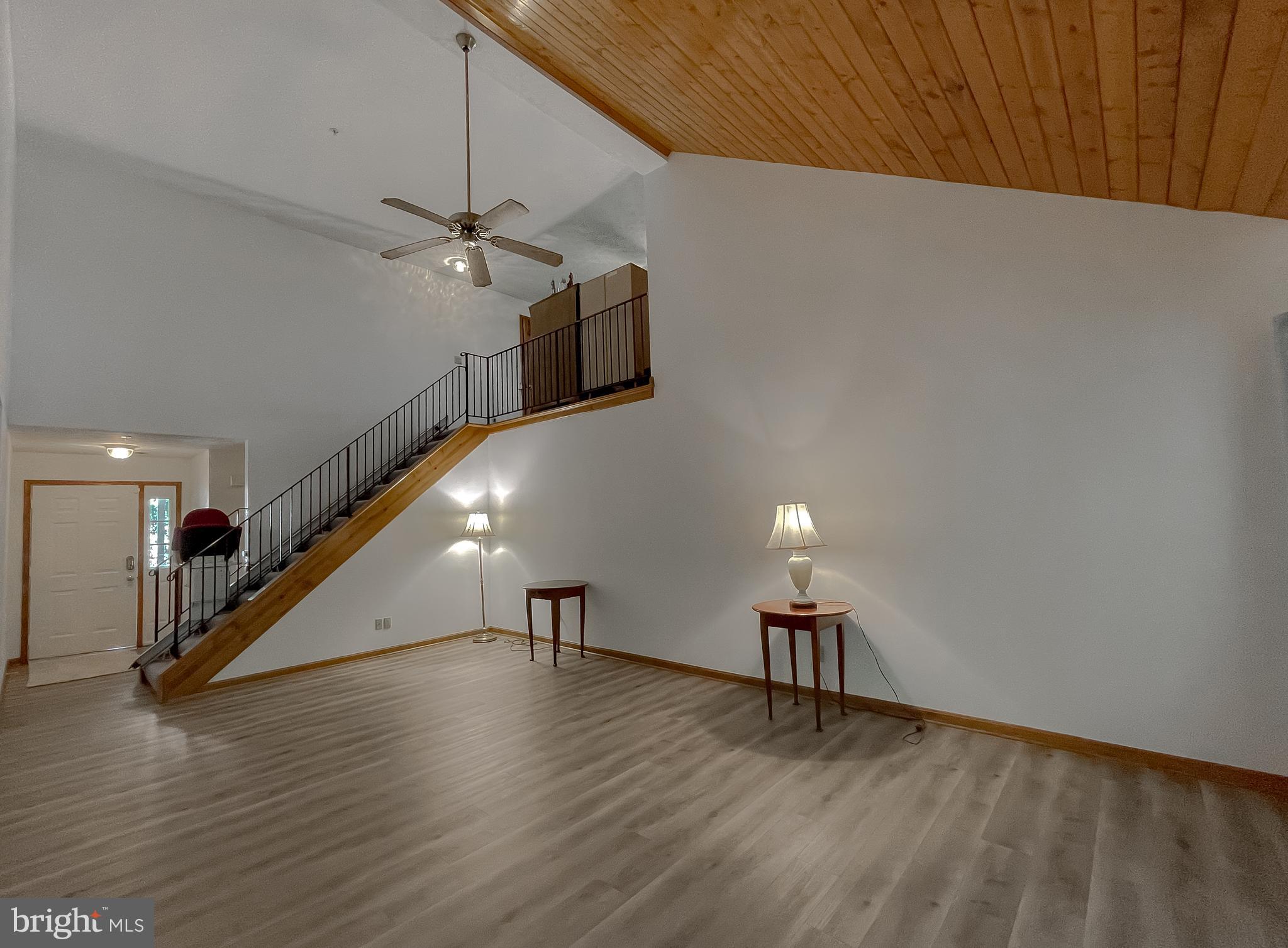 44059 Fieldstone Way California, MD 20619 - Photo 14 of 42 a view of a room with wooden floor