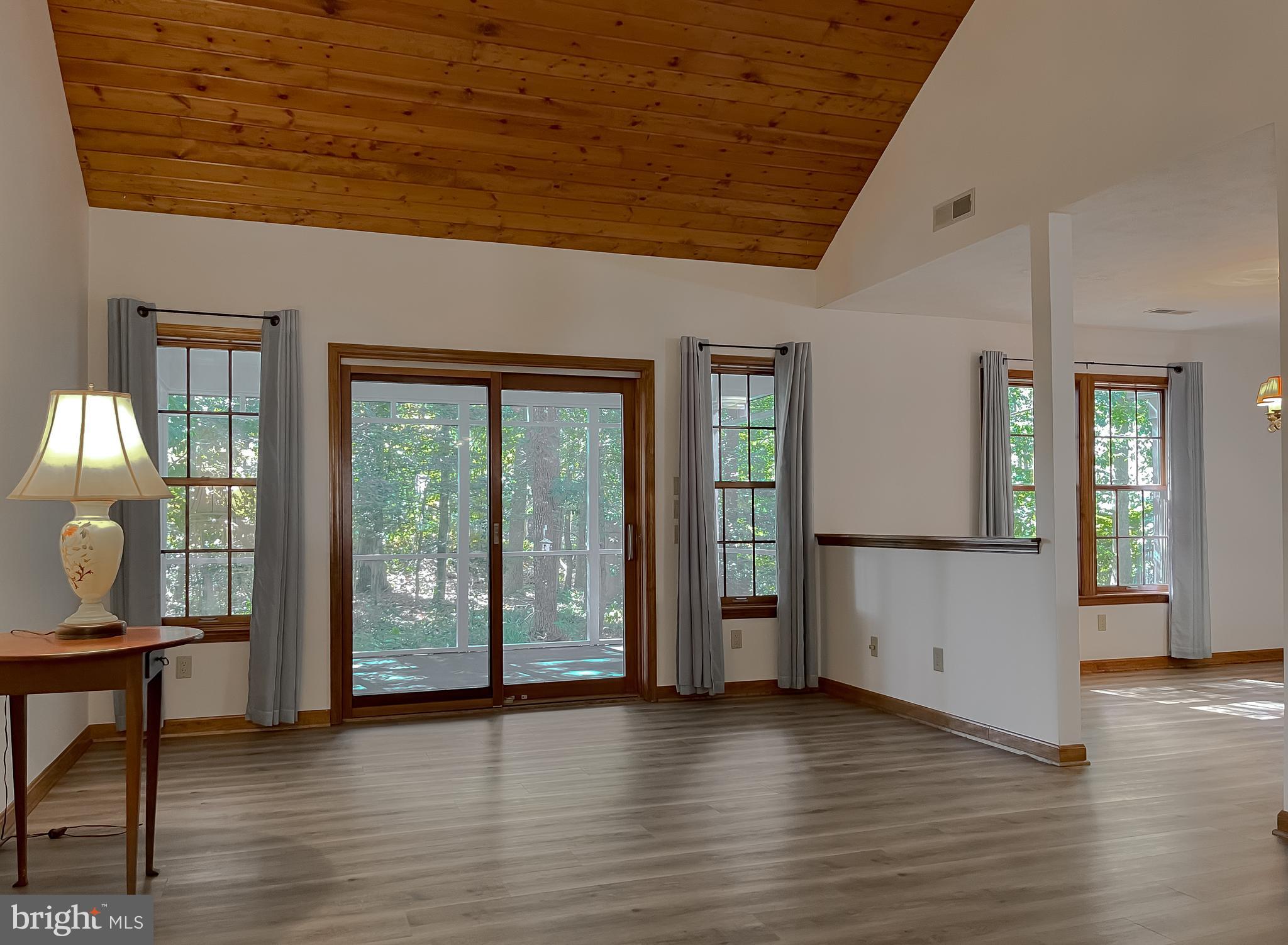 44059 Fieldstone Way California, MD 20619 - Photo 15 of 42 a view of a livingroom with wooden floor and furniture