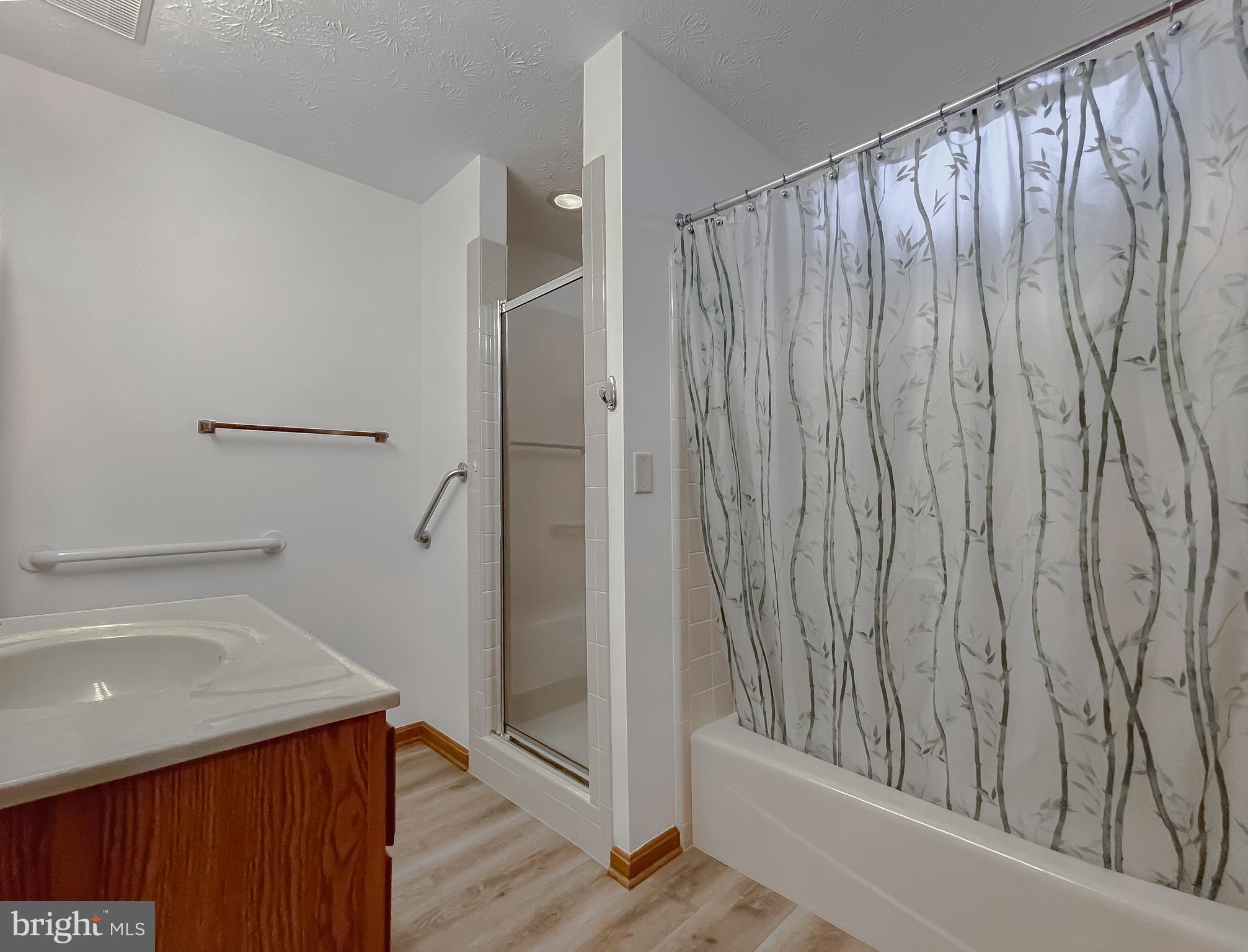 44059 Fieldstone Way California, MD 20619 - Photo 29 of 42 a bathroom with a shower and a sink