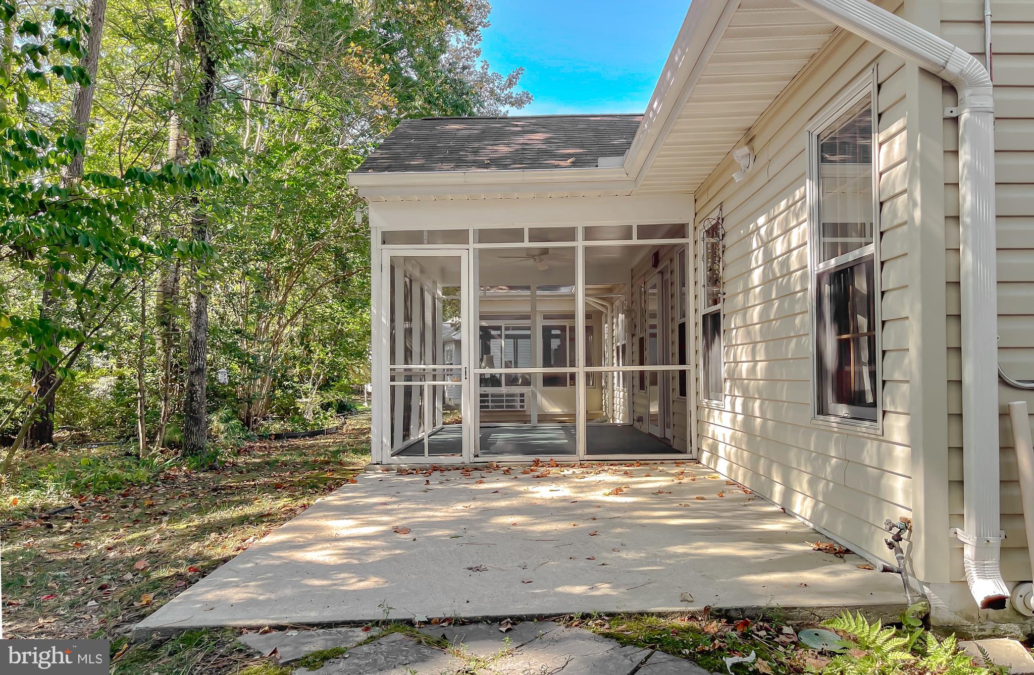 44059 Fieldstone Way California, MD 20619 - Photo 40 of 42 a view of a brick house with many windows