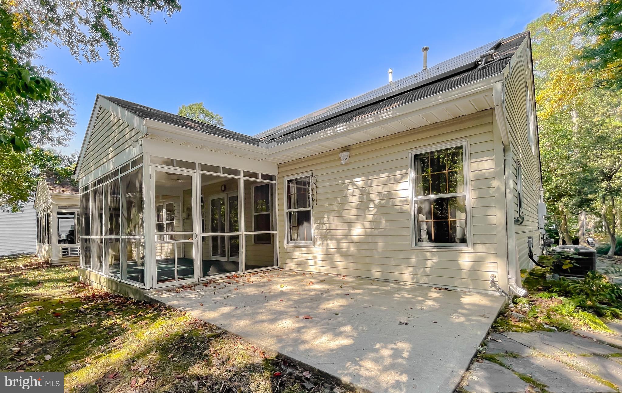 44059 Fieldstone Way California, MD 20619 - Photo 8 of 42 a front view of a house with a large window