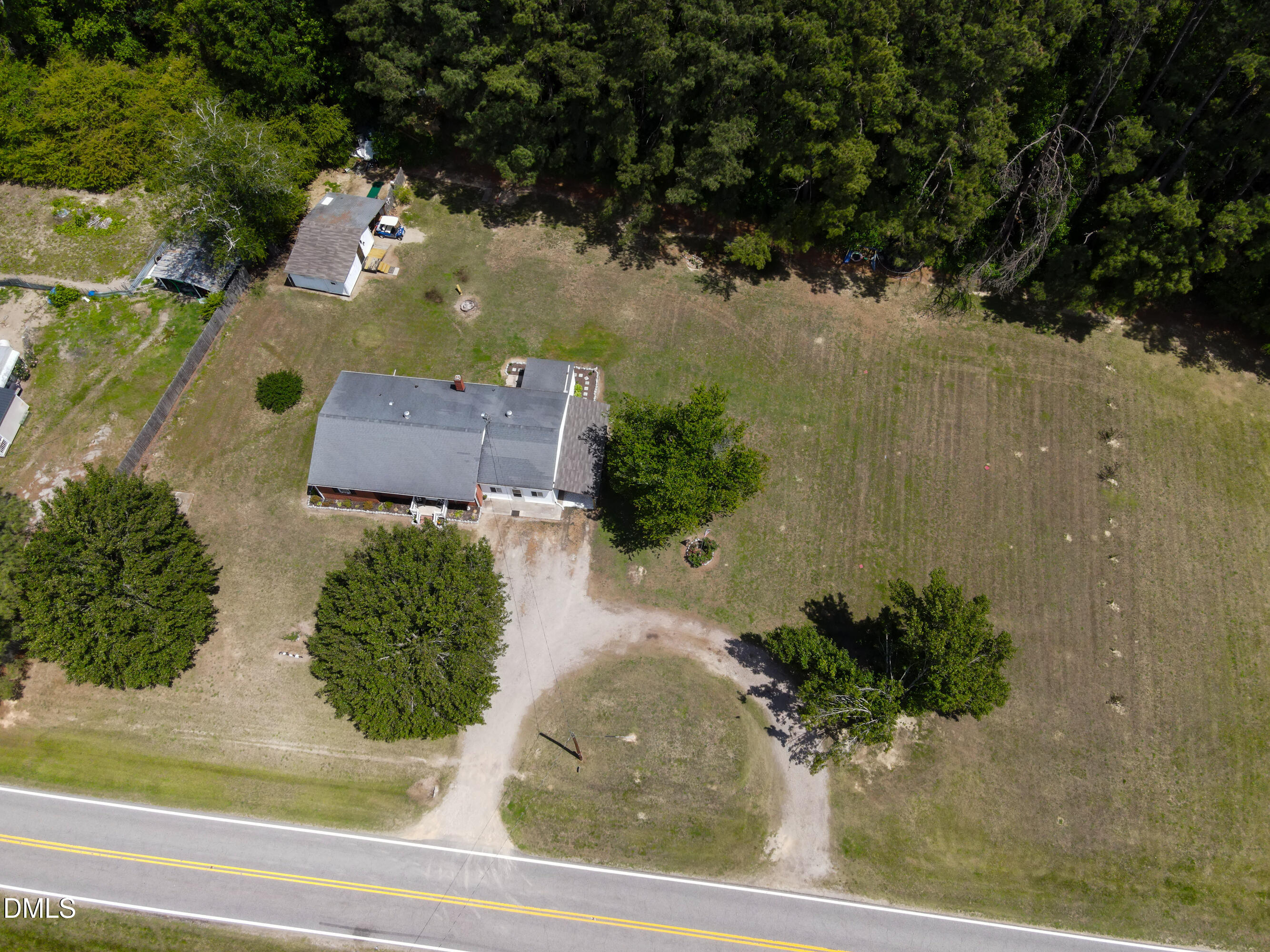 4967 Highway 581 Spring Hope, NC 27882 - Photo 35 of 44 an aerial view of a house with a yard
