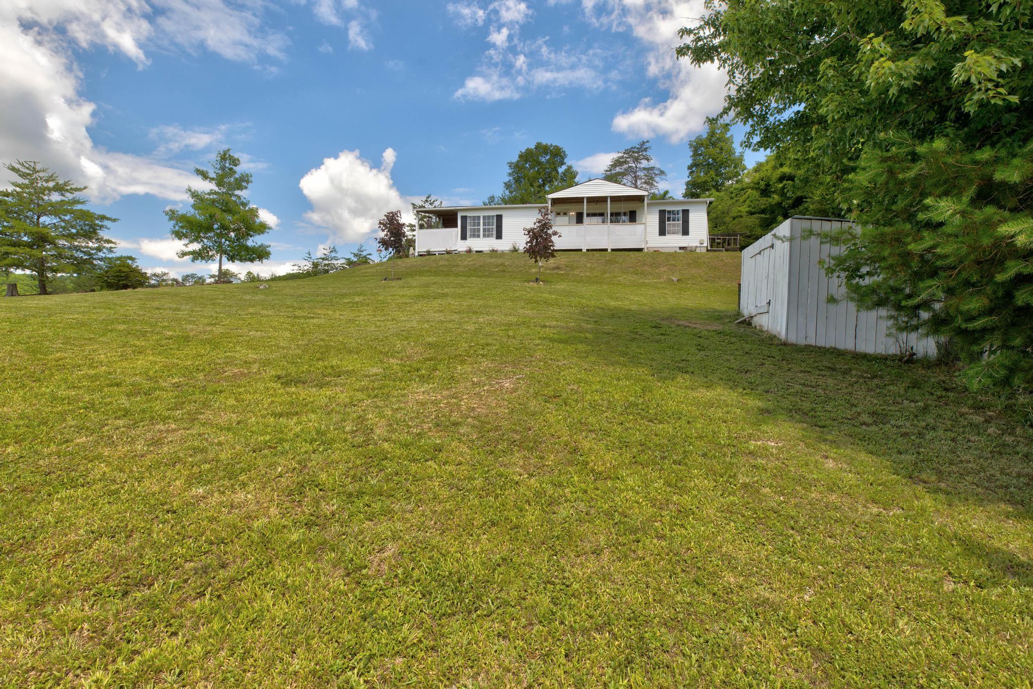 125 Wild Ridge Road Morehead, KY 40351 - Photo 6 of 31 Front Twilight 2
