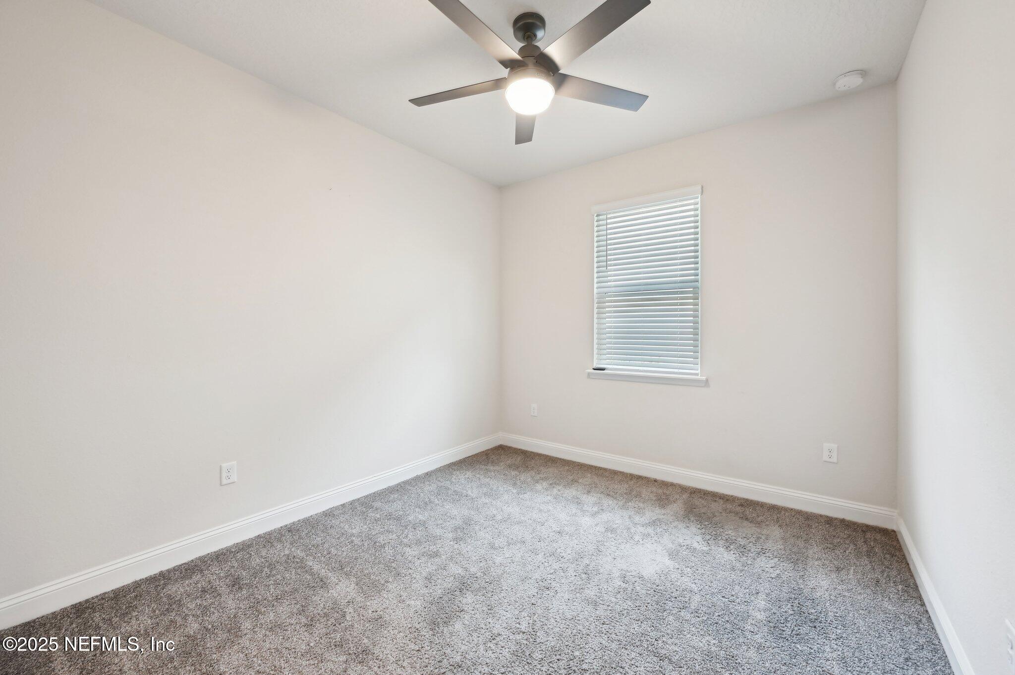 108 Wards Ravine Way St. Johns, FL 32259 - Photo 35 of 53 a view of an empty room with a window