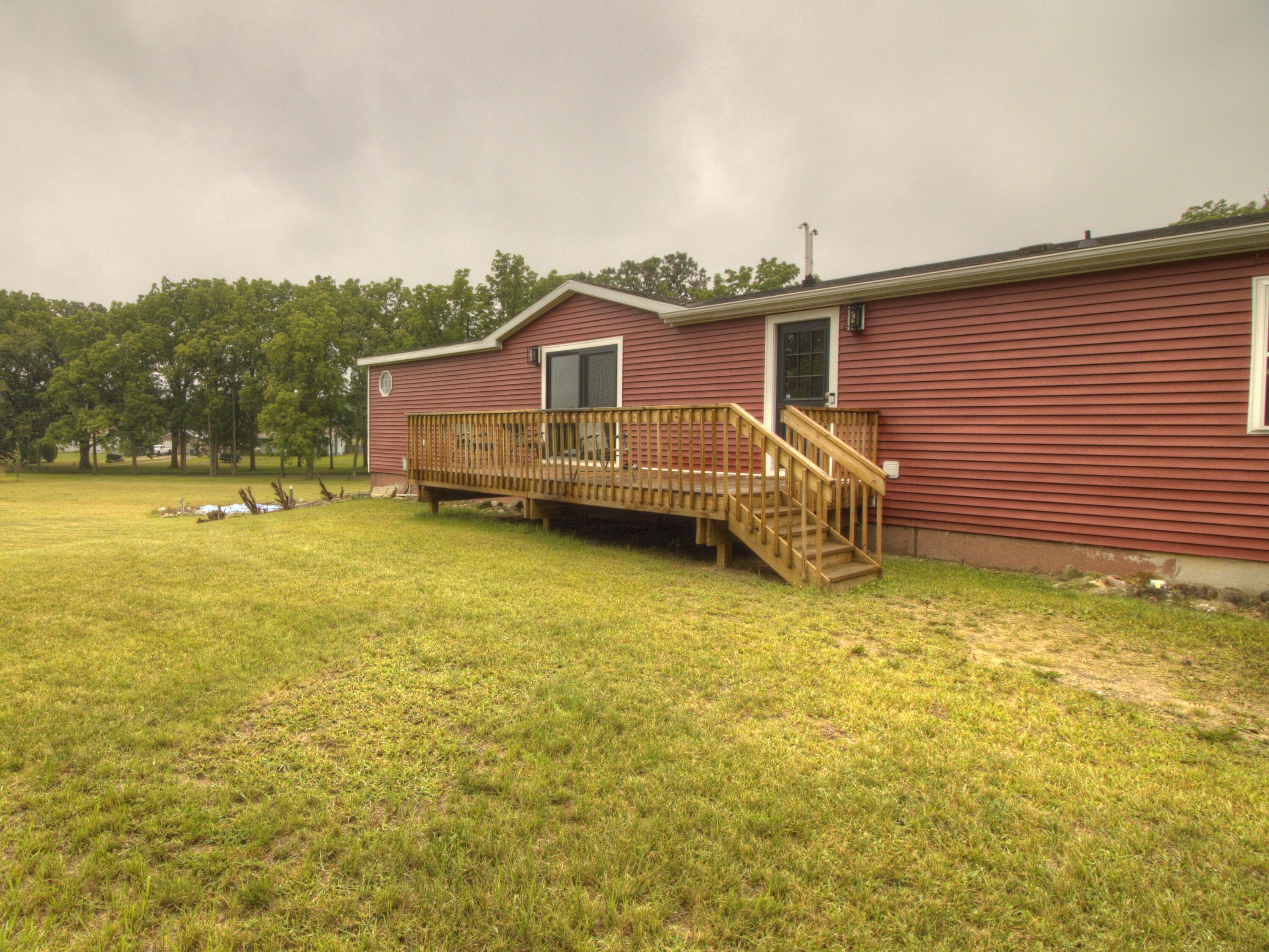 8529 Newcomb Road Vestaburg, MI 48891 - Photo 3 of 24 rear deck