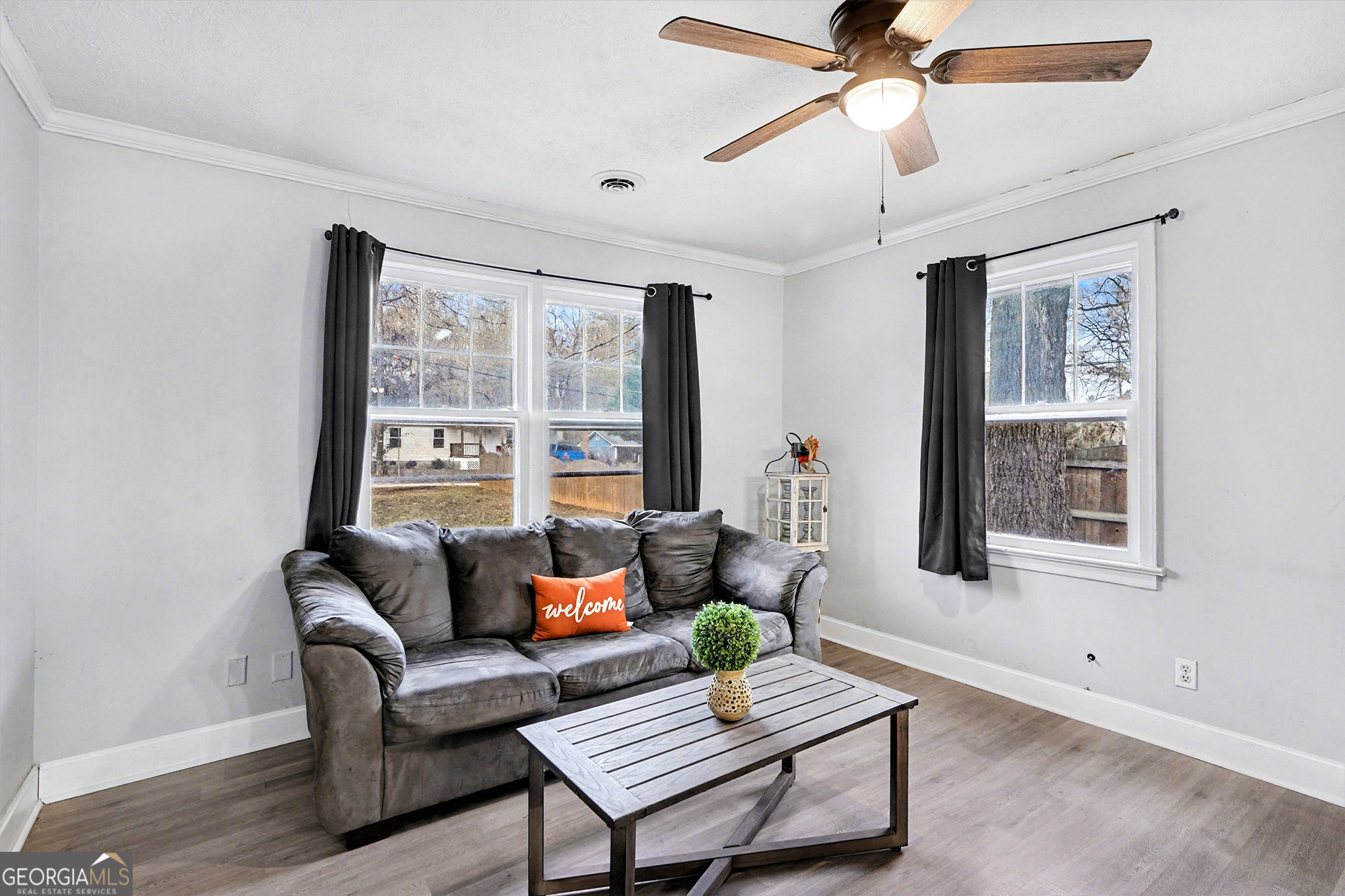 112 Oak Avenue Griffin, GA 30224 - Photo 4 of 16 a living room with furniture and a window