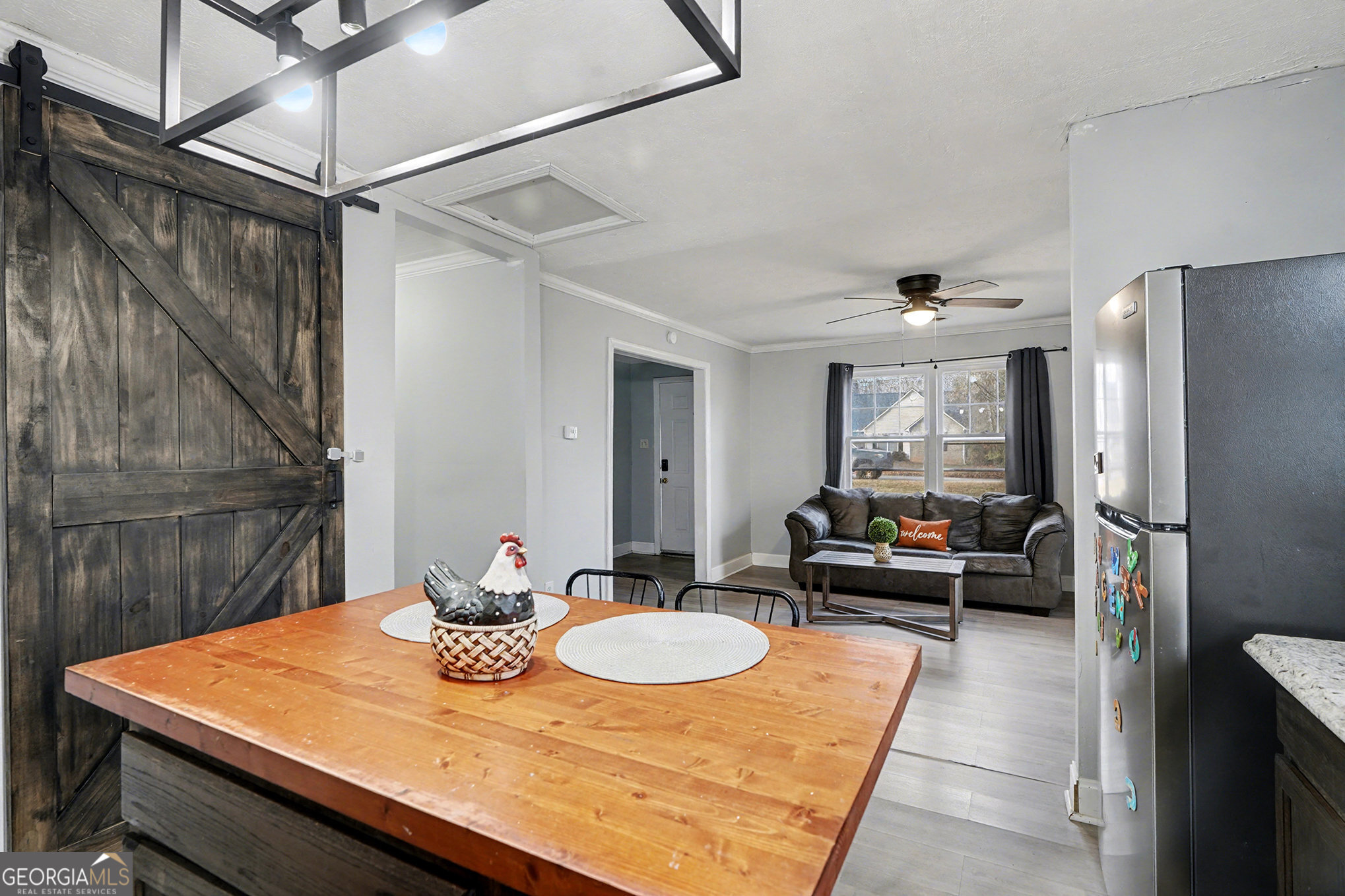 112 Oak Avenue Griffin, GA 30224 - Photo 7 of 16 a kitchen with a table and chairs in it