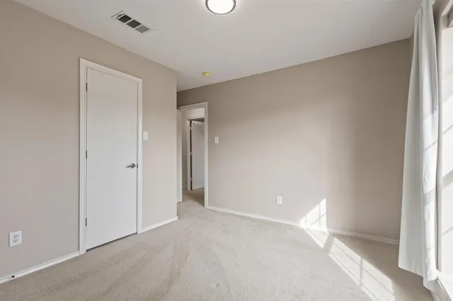 a bathroom with a sink toilet a mirror and shower