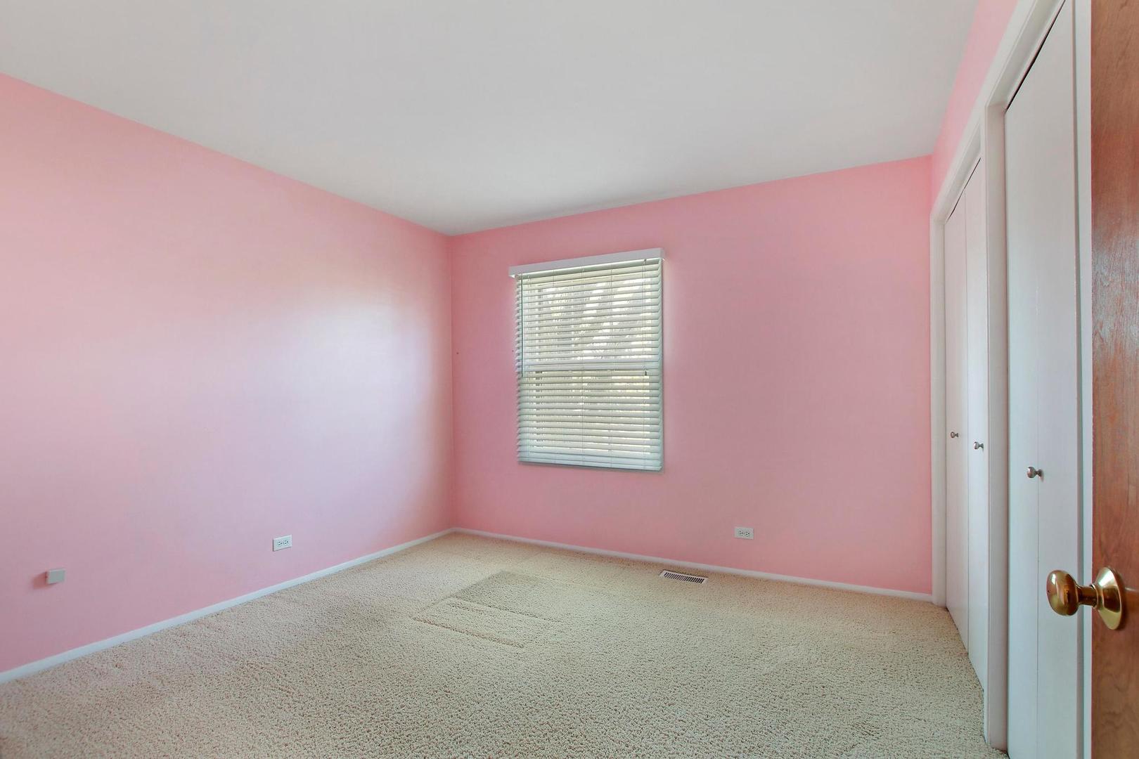 1155 Cayuga Drive Northbrook, IL 60062 - Photo 19 of 28 an empty room with windows