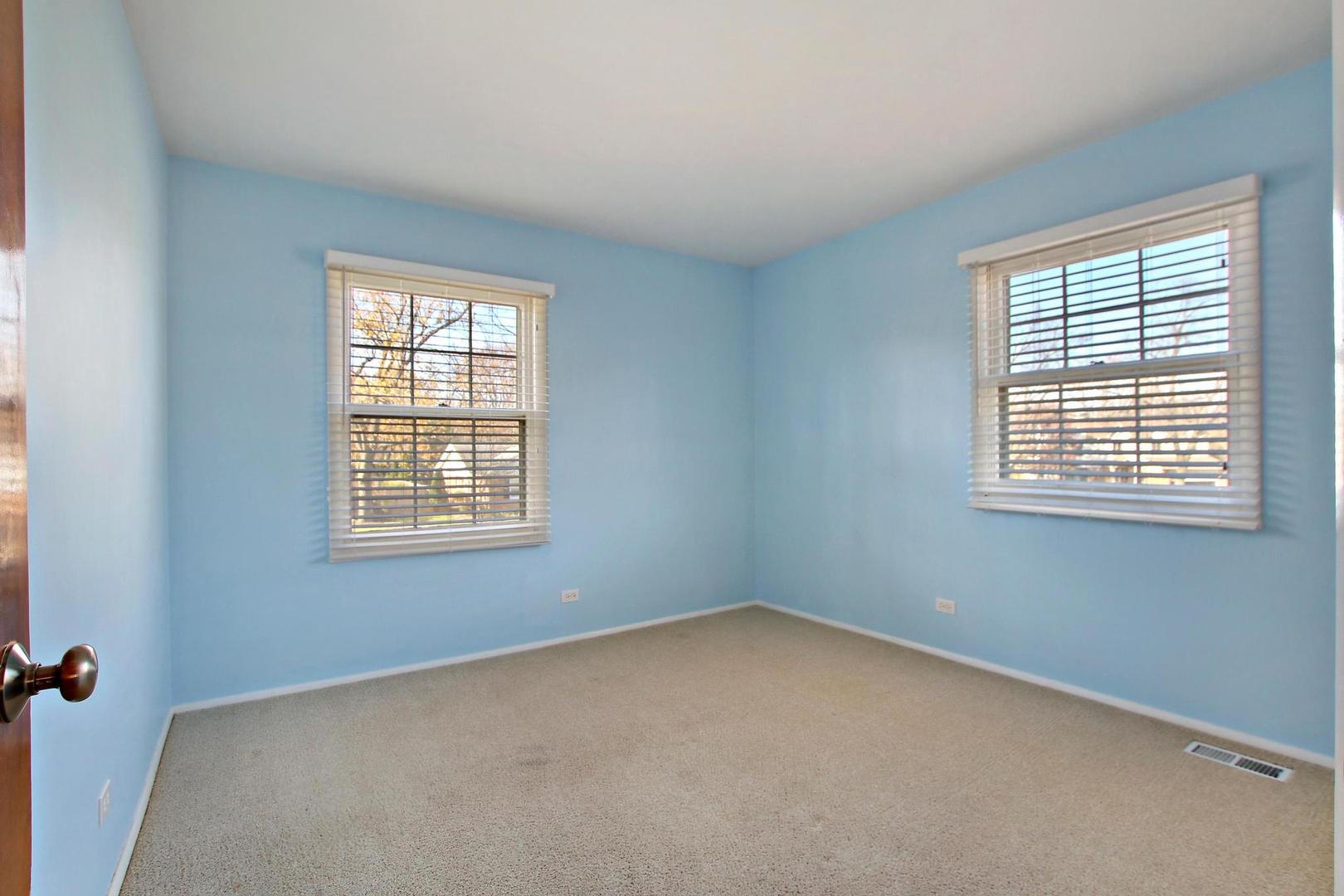 1155 Cayuga Drive Northbrook, IL 60062 - Photo 20 of 28 an empty room with a window