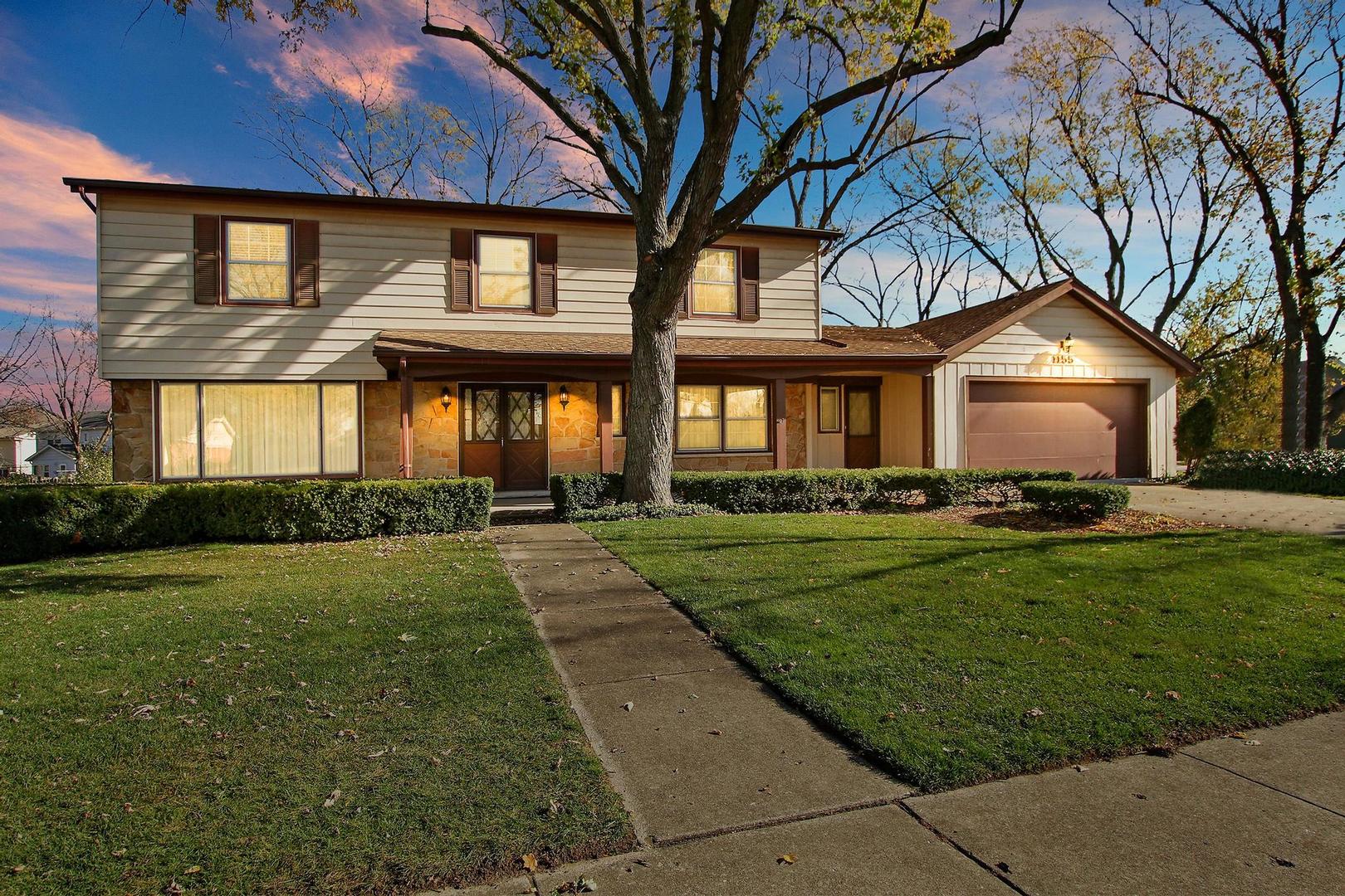 1155 Cayuga Drive Northbrook, IL 60062 - Photo 28 of 28 a front view of a house with a yard