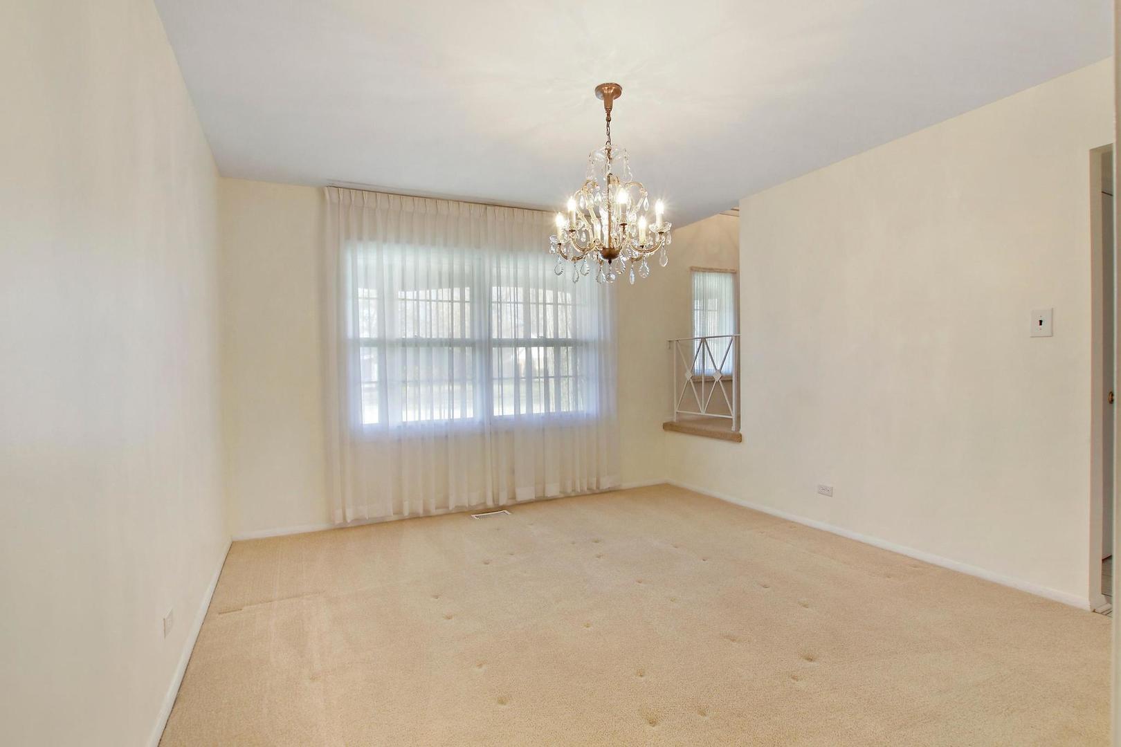 1155 Cayuga Drive Northbrook, IL 60062 - Photo 5 of 28 a view of empty room with window