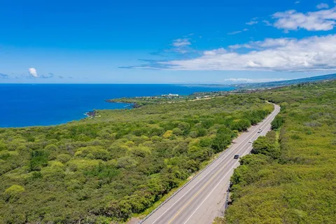 a view of a yard with an ocean