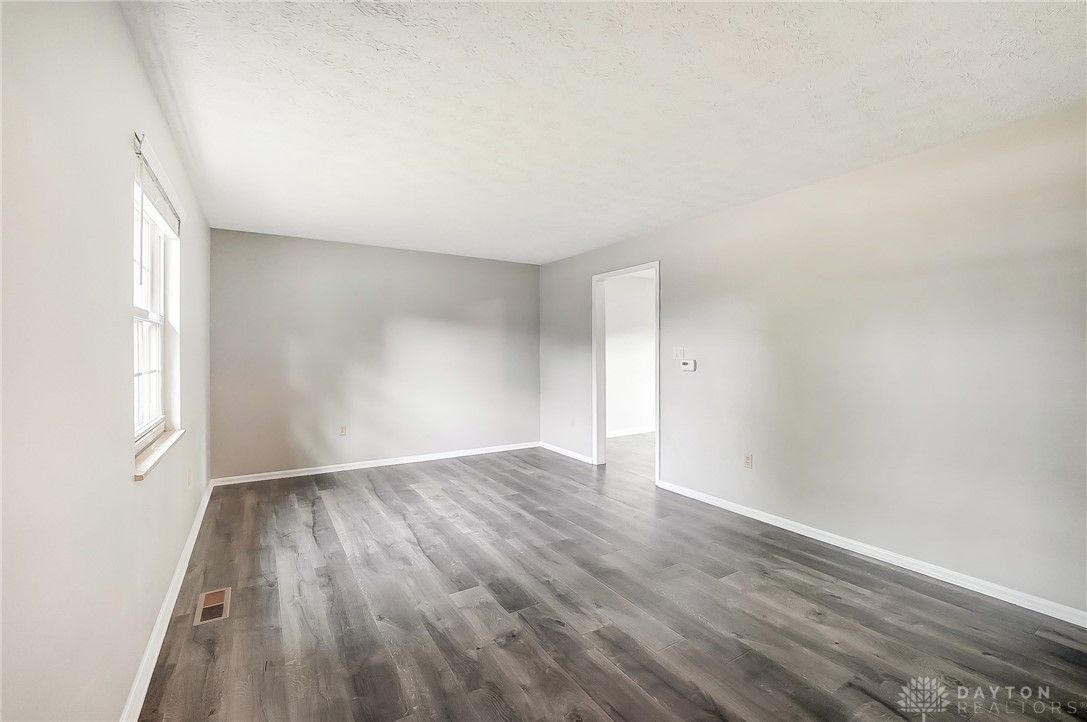 5645 Powell Road Dayton, OH 45424 - Photo 2 of 27 The large Living room is available for TV & gatherings. Open to the Dining Room