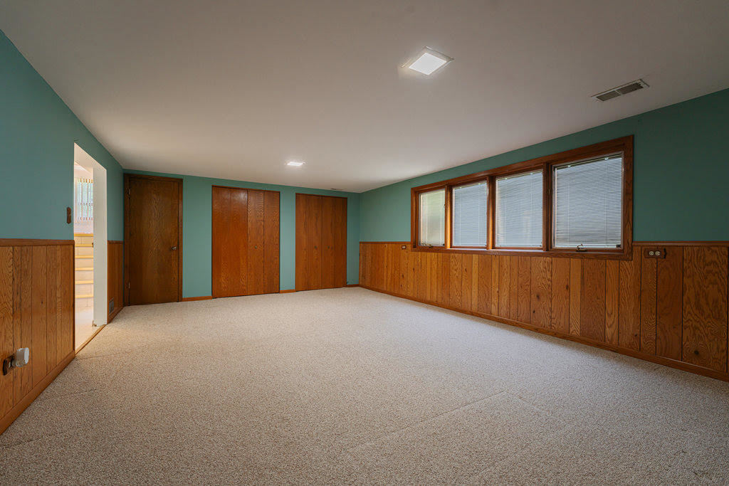 14322 McCarthy Road Lemont, IL 60439 - Photo 18 of 37 a view of an empty room with a window