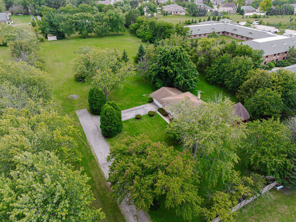 14322 McCarthy Road Lemont, IL 60439 - Photo 33 of 37 an aerial view of residential house with outdoor space and trees all around