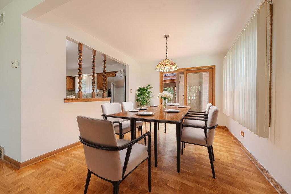 14322 McCarthy Road Lemont, IL 60439 - Photo 7 of 37 a view of a dining room with furniture and window